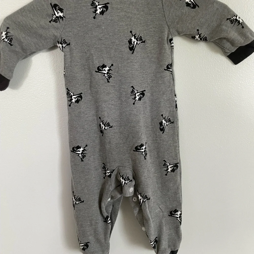 Kids One Piece Footie sleeper size 9 months  Jordan Nike air